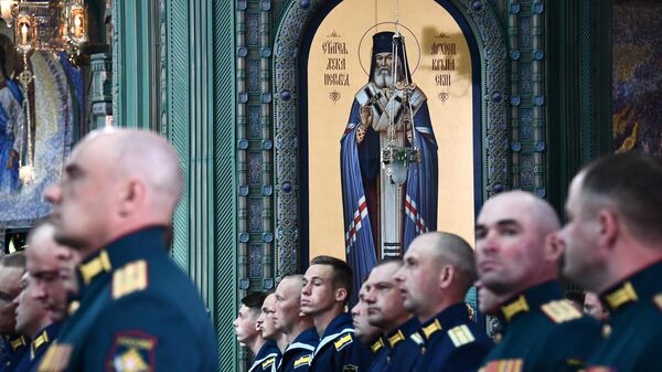 Военнослужащие во время церемонии освящения главного храма Вооруженных сил РФ в парке Патриот в Московской области Военнослужащие во время церемонии освящения главного храма Вооруженных сил РФ в парке Патриот в Московской области