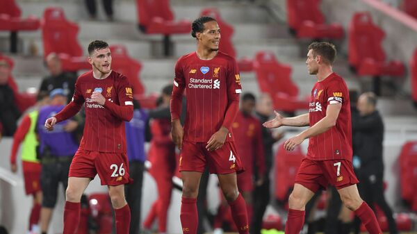 Liverpool's Scottish defender Andrew Robertson (L), Liverpool's Dutch defender Virgil van Dijk (C) and Liverpool's English midfielder James Milner react after the English Premier League football match between Liverpool and Chelsea at Anfield in Liverpool, north west England on July 22, 2020. - Liverpool won the match 5-3. (Photo by Paul ELLIS / POOL / AFP) / RESTRICTED TO EDITORIAL USE. No use with unauthorized audio, video, data, fixture lists, club/league logos or 'live' services. Online in-match use limited to 120 images. An additional 40 images may be used in extra time. No video emulation. Social media in-match use limited to 120 images. An additional 40 images may be used in extra time. No use in betting publications, games or single club/league/player publications. / 