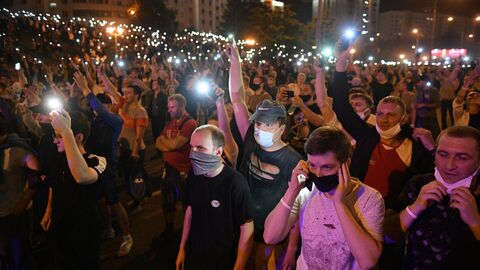 Участники акции протеста на одной из улиц в Минске Участники акции протеста на одной из улиц в Минске
