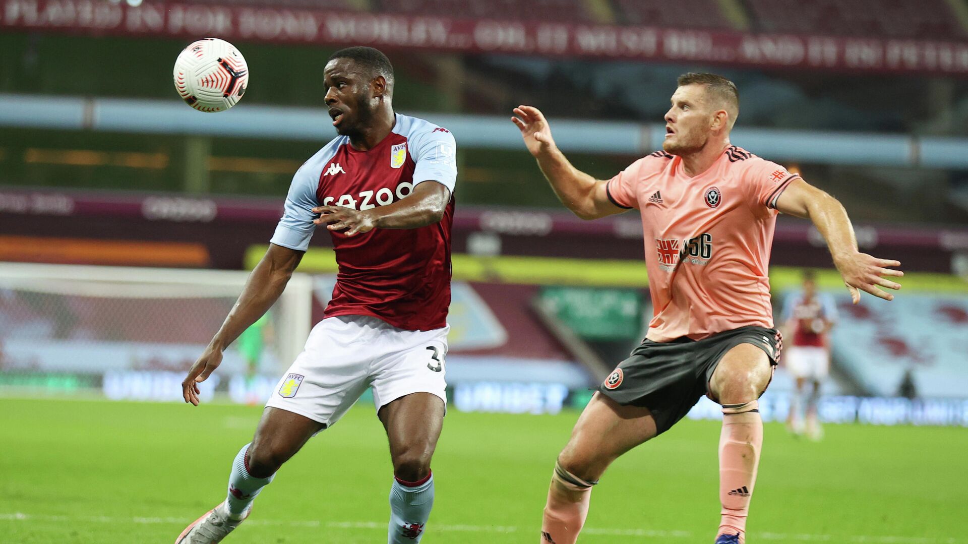 Soccer Football - Premier League - Aston Villa v Sheffield United - Villa Park, Birmingham, Britain - September 21, 2020 Aston Villa's Keinan Davis in action with Sheffield United's Jack O'Connell Pool via REUTERS/Julian Finney EDITORIAL USE ONLY. No use with unauthorized audio, video, data, fixture lists, club/league logos or 'live' services. Online in-match use limited to 75 images, no video emulation. No use in betting, games or single club/league/player publications. Please contact your account representative for further details. Soccer Football - Premier League - Aston Villa v Sheffield United - Villa Park, Birmingham, Britain - September 21, 2020 Aston Villa's Keinan Davis in action with Sheffield United's Jack O'Connell Pool via REUTERS/Julian Finney EDITORIAL USE ONLY. No use with unauthorized audio, video, data, fixture lists, club/league logos or 'live' services. Online in-match use limited to 75 images, no video emulation. No use in betting, games or single club/league/player publications. Please contact your account representative for further details. - РИА Новости, 1920, 22.09.2020