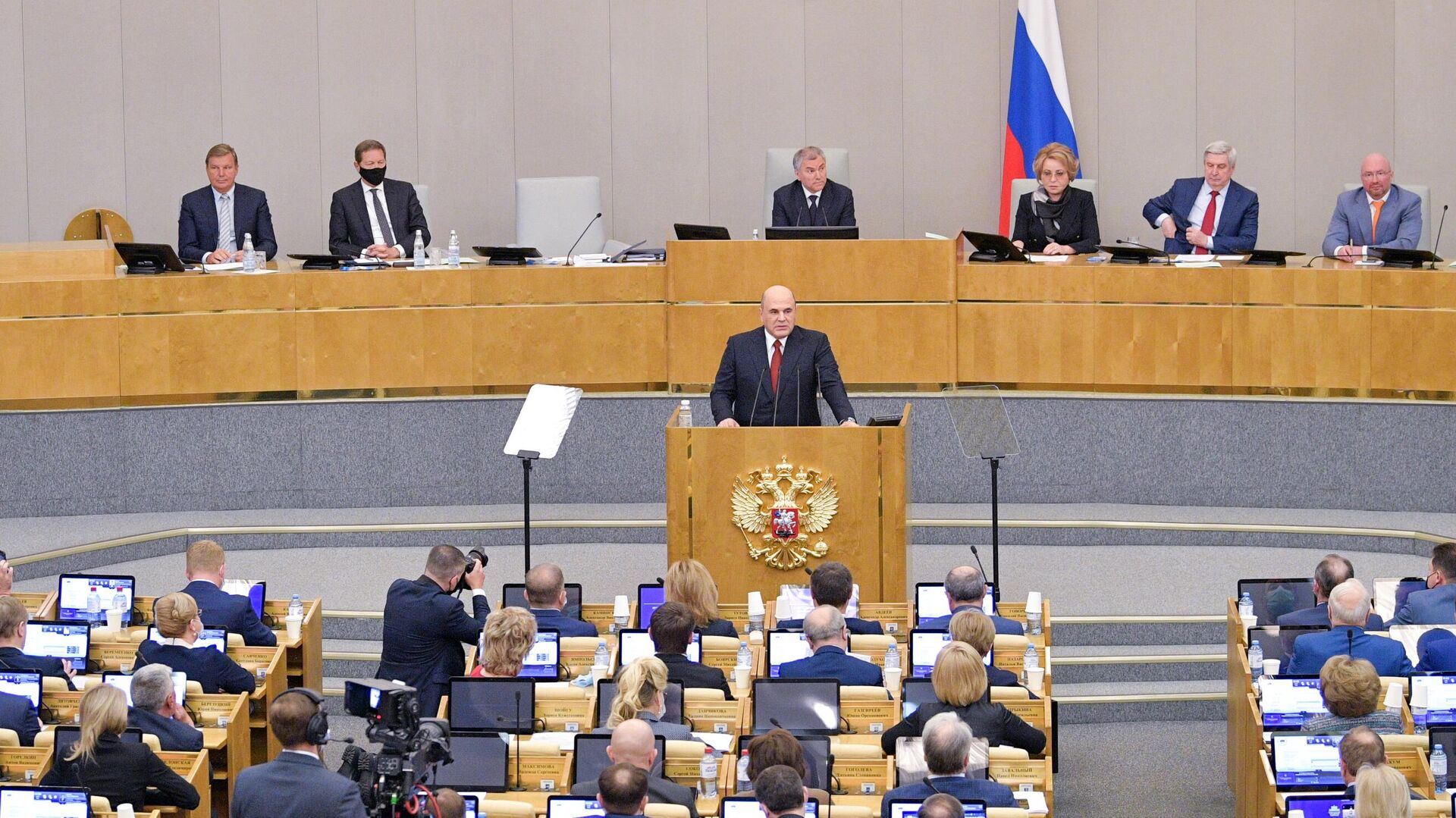 Председатель правительства РФ Михаил Мишустин выступает в Государственной думе РФ с отчетом о работе правительства за 2020 год Председатель правительства РФ Михаил Мишустин выступает в Государственной думе РФ с отчетом о работе правительства за 2020 год - РИА Новости, 1920, 12.05.2021