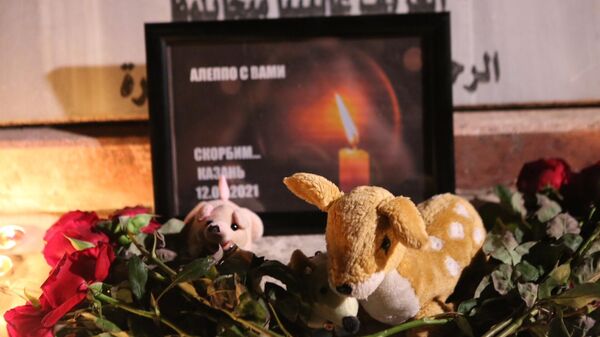 Акция памяти погибшим в казанской школе в Алеппо Акция памяти погибшим в казанской школе в Алеппо