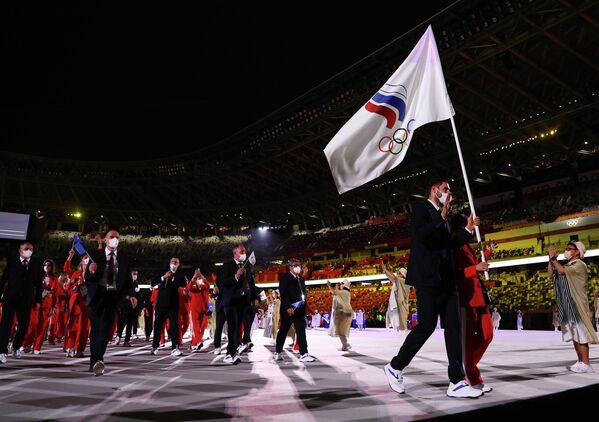 Российские спортсмены на церемонии открытия Олимпийских игр в Токио. Российские спортсмены на церемонии открытия Олимпийских игр в Токио.