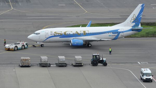 Пассажирский самолет Боинг-757 казахстанской авиакомпании SCAT (СКАТ). Архивное фото Пассажирский самолет Боинг-757 казахстанской авиакомпании SCAT (СКАТ). Архивное фото