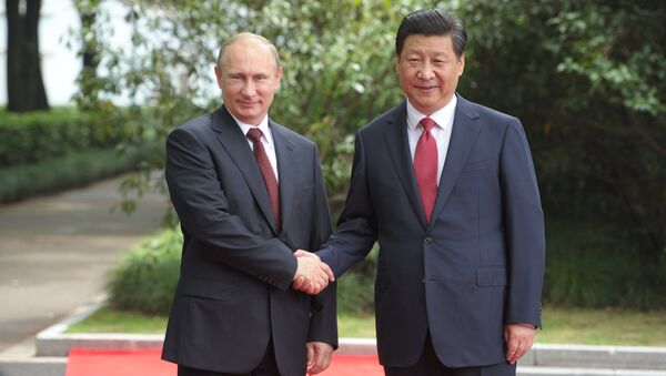 Президент России Владимир Путин и председатель Китайской народной республики Си Цзиньпин. Архивное фото Президент России Владимир Путин и председатель Китайской народной республики Си Цзиньпин. Архивное фото