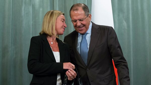 Министр иностранных дел Италии Федерика Могерини и министр иностранных дел России Сергей Лавров. Архивное фото Министр иностранных дел Италии Федерика Могерини и министр иностранных дел России Сергей Лавров. Архивное фото