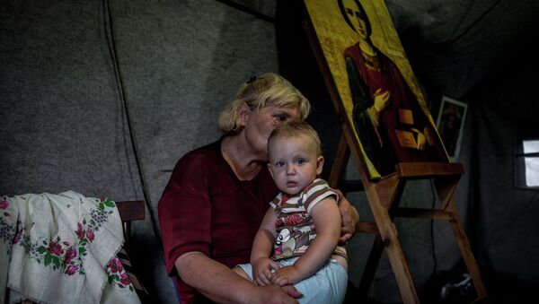 Беженцы из Украины. Архивное фото Беженцы из Украины. Архивное фото
