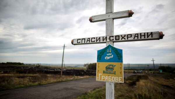 Крест в селе Грабово Донецкой области, в районе которого потерпел крушение лайнер Boeing 777 Малайзийских авиалиний Крест в селе Грабово Донецкой области, в районе которого потерпел крушение лайнер Boeing 777 Малайзийских авиалиний