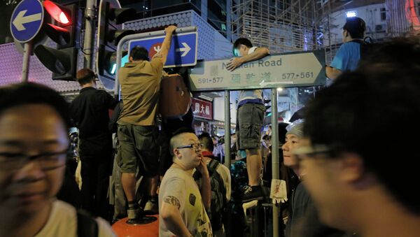 Столкновения активистов движения Occupy Central с полицией в Гонконге, Архивное фото Столкновения активистов движения Occupy Central с полицией в Гонконге, Архивное фото