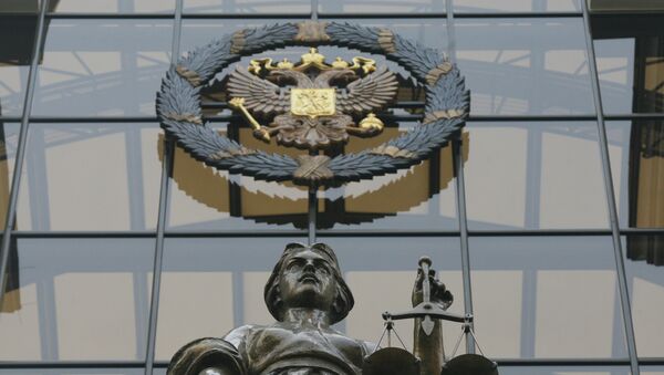 Статуя Фемиды на фасаде здания верховного суда РФ в Москве. Архивное фото Статуя Фемиды на фасаде здания верховного суда РФ в Москве. Архивное фото