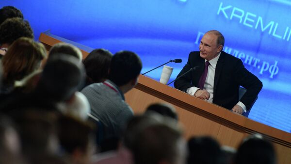 Президент России Владимир Путин на большой ежегодной пресс-конференции. Архивное фото Президент России Владимир Путин на большой ежегодной пресс-конференции. Архивное фото