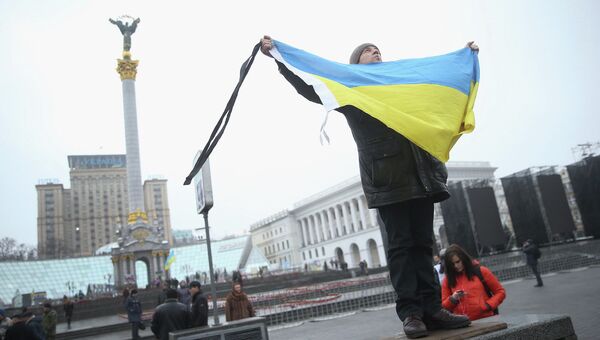 Участник акции, посвященной годовщине событий на площади Независимости в Киеве. Архивное фото. Участник акции, посвященной годовщине событий на площади Независимости в Киеве. Архивное фото.