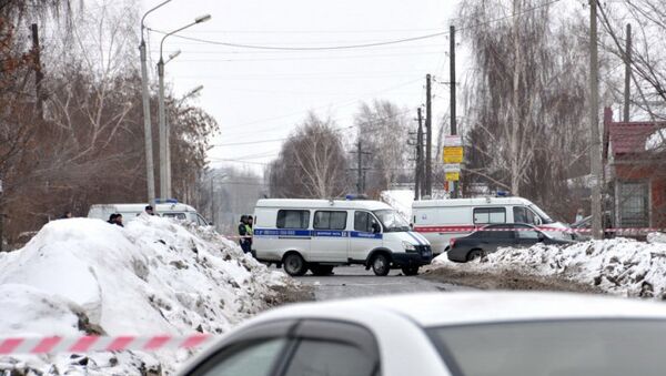 Машины полиции на месте стрельбы в Омске Машины полиции на месте стрельбы в Омске