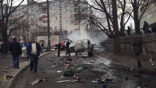 Кадр из видео с места взрыва автомобиля командира украинского добровольческого батальона Слобожанщина Андрея Янголенко в Харькове Кадр из видео с места взрыва автомобиля командира украинского добровольческого батальона Слобожанщина Андрея Янголенко в Харькове