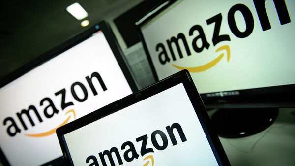 Amazon - американская компания, крупнейшая в мире по обороту среди продающих товары и услуги через Интернет. Архивное фото Amazon - американская компания, крупнейшая в мире по обороту среди продающих товары и услуги через Интернет. Архивное фото