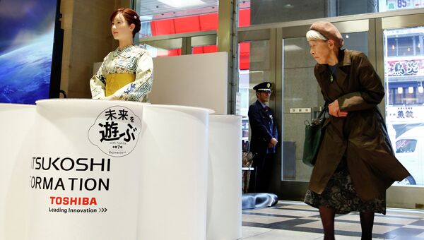 Человекоподобный робот Aiko Chihira, разработка Toshiba. Архивное фото Человекоподобный робот Aiko Chihira, разработка Toshiba. Архивное фото