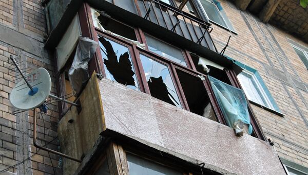 Последствия обстрела в Донецке. Архивное фото Последствия обстрела в Донецке. Архивное фото