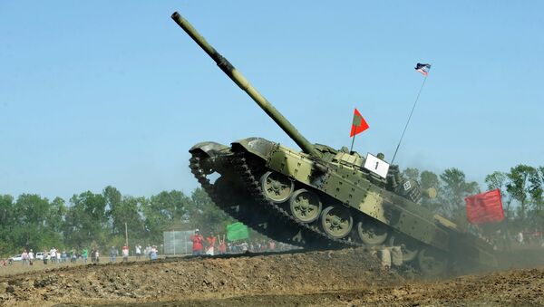 Один из участников во время соревнований танковых подразделений ополчения ДНР. Архивное фото Один из участников во время соревнований танковых подразделений ополчения ДНР. Архивное фото