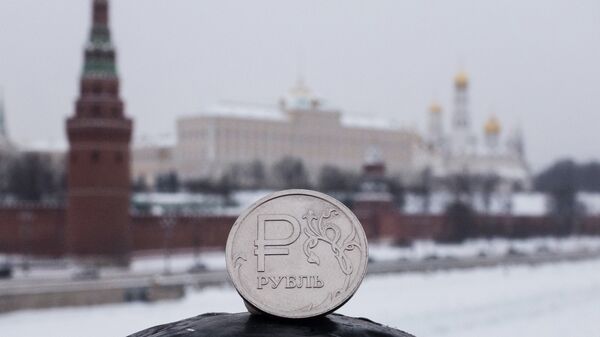 Российский рубль. Архивное фото Российский рубль. Архивное фото