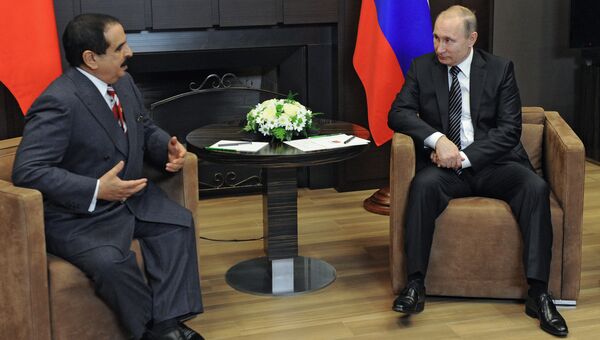 Президент России Владимир Путин и король Бахрейна Хамад бен Иса аль-Халифа во время встречи в резиденции Бочаров ручей Президент России Владимир Путин и король Бахрейна Хамад бен Иса аль-Халифа во время встречи в резиденции Бочаров ручей