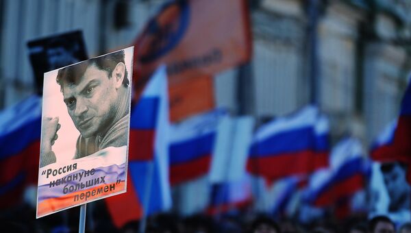 Участники марша памяти, посвященного годовщине гибели политика, общественного деятеля Бориса Немцова. Архивное фото Участники марша памяти, посвященного годовщине гибели политика, общественного деятеля Бориса Немцова. Архивное фото