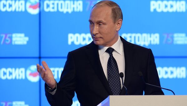 Президент Российской Федерации Владимир Путин во время посещения Международного информационного агентства Россия сегодня Президент Российской Федерации Владимир Путин во время посещения Международного информационного агентства Россия сегодня