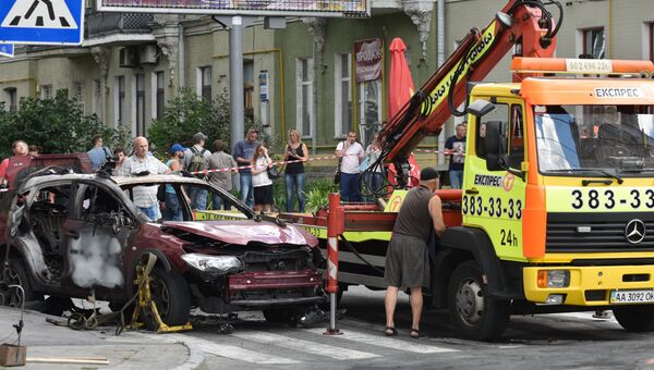 Взорванный автомобиль на перекрестке улиц Богдана Хмельницкого и Ивана Франко, в котором погиб журналист Павел Шеремет Взорванный автомобиль на перекрестке улиц Богдана Хмельницкого и Ивана Франко, в котором погиб журналист Павел Шеремет