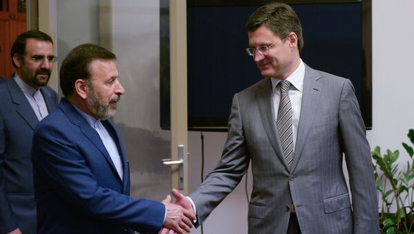 Министр энергетики РФ Александр Новак и министр связи и информационных технологий Ирана Махмуд Ваэзи. Архивное фото Министр энергетики РФ Александр Новак и министр связи и информационных технологий Ирана Махмуд Ваэзи. Архивное фото