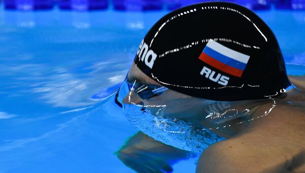 Антон Чупков в финальном заплыве на 200 м брассом во время соревнований по плаванию на XXXI летних Олимпийских играх Антон Чупков в финальном заплыве на 200 м брассом во время соревнований по плаванию на XXXI летних Олимпийских играх