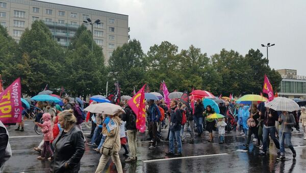 Участники акции протеста против TTIP в Берлине Участники акции протеста против TTIP в Берлине