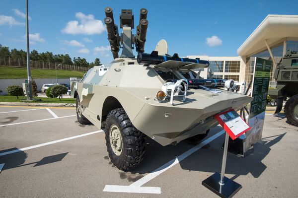 Турецкий противотанковый ракетный комплекс Roketsan на базе БТР на выставке вооружений и боевой техники ADEX-2016 в Баку Турецкий противотанковый ракетный комплекс Roketsan на базе БТР на выставке вооружений и боевой техники ADEX-2016 в Баку