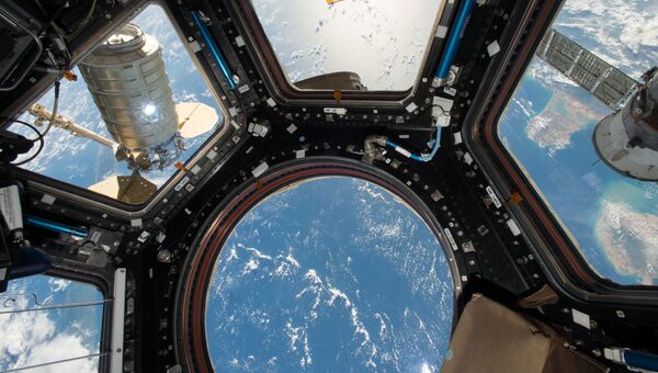 Космический грузовой корабль Cygnus прикрепленный к модулю МКС Космический грузовой корабль Cygnus прикрепленный к модулю МКС