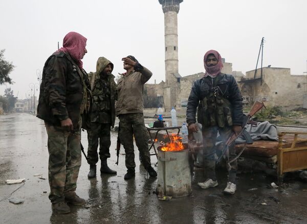 Военнослужащие в освобожденном квартале восточного Алеппо Военнослужащие в освобожденном квартале восточного Алеппо
