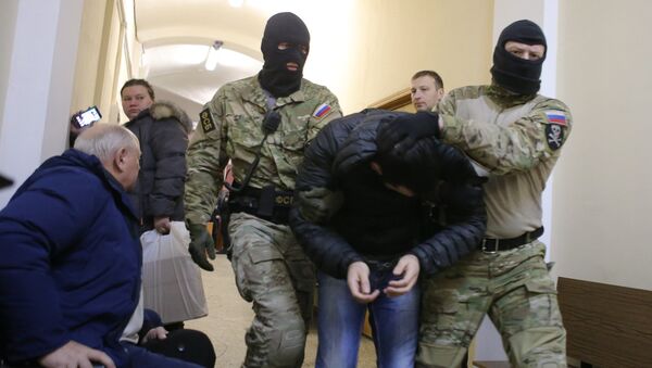 Подозреваемый в подготовке терактов в Москве Тамерлан Сычоев в Мещанском суде Подозреваемый в подготовке терактов в Москве Тамерлан Сычоев в Мещанском суде