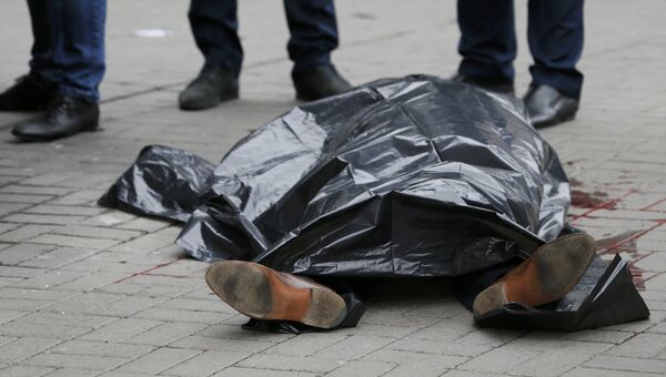 На месте убийства бывшего депутата Госдумы России Дениса Вороненкова в Киеве, Украина. 23 марта 2017 На месте убийства бывшего депутата Госдумы России Дениса Вороненкова в Киеве, Украина. 23 марта 2017