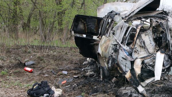 На месте подрыва автомобиля наблюдателей ОБСЕ близ села Пришиб в ЛНР. Архивное фото На месте подрыва автомобиля наблюдателей ОБСЕ близ села Пришиб в ЛНР. Архивное фото