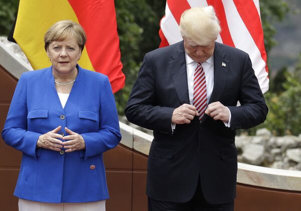 Ангела Меркель и Дональд Трамп во время саммита G7 в Таормине, Италия. 26 мая 2017 Ангела Меркель и Дональд Трамп во время саммита G7 в Таормине, Италия. 26 мая 2017