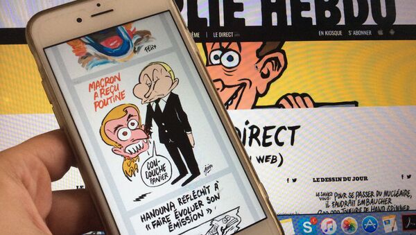 Карикатура в журнале Charlie Hebdo Карикатура в журнале Charlie Hebdo
