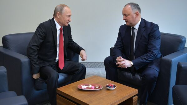 Президент РФ Владимир Путин и президент Республики Молдова Игорь Додон во время встречи в рамках ПМЭФ-2017. 2 июня 2017 Президент РФ Владимир Путин и президент Республики Молдова Игорь Додон во время встречи в рамках ПМЭФ-2017. 2 июня 2017
