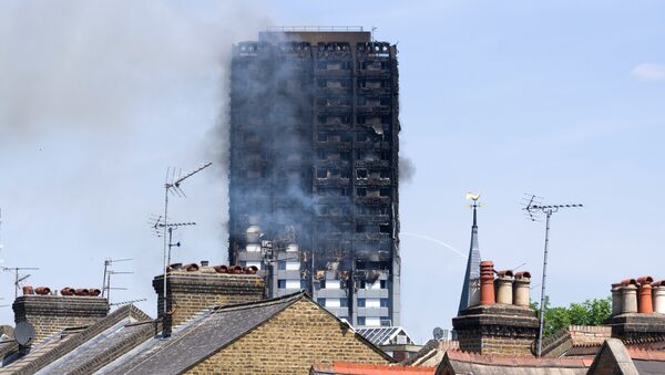 Пожар в многоэтажном доме Grenfell Tower в Лондоне. Архивное фото Пожар в многоэтажном доме Grenfell Tower в Лондоне. Архивное фото