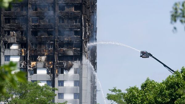 Пожар в многоэтажном жилом доме на западе Лондона. Архивное фото Пожар в многоэтажном жилом доме на западе Лондона. Архивное фото
