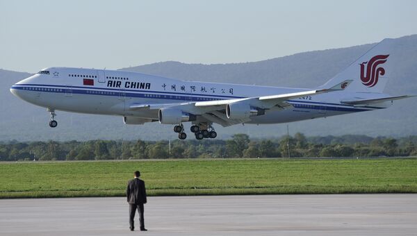 Самолет авиакомпании Air China. Архивное фото Самолет авиакомпании Air China. Архивное фото