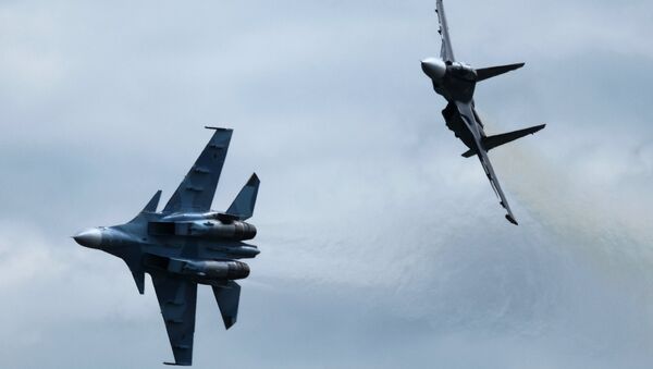 Многоцелевые истребители Су-30СМ. Архивное фото Многоцелевые истребители Су-30СМ. Архивное фото