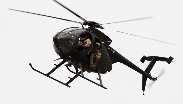 Вертолет частной военной компании DynCorp в Багдаде, Ирак Вертолет частной военной компании DynCorp в Багдаде, Ирак