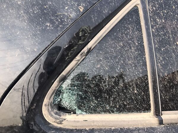 Машина, в которой находился попавший под обстрел в Сирии корреспондент РИА Новости Машина, в которой находился попавший под обстрел в Сирии корреспондент РИА Новости