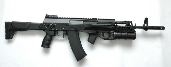 Новый автомат Калашникова АК-12 образца 2012 года, разработанный концерном ОАО НПО Ижмаш Новый автомат Калашникова АК-12 образца 2012 года, разработанный концерном ОАО НПО Ижмаш