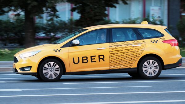 Автомобиль службы Uber. Архивное фото Автомобиль службы Uber. Архивное фото
