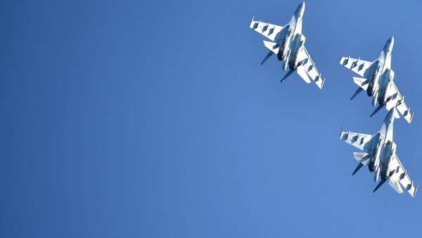 Многоцелевые истребители Су-35. Архивное фото Многоцелевые истребители Су-35. Архивное фото