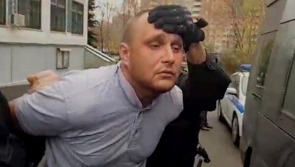 Александр Масленников во время задержания Александр Масленников во время задержания