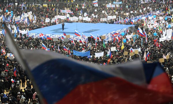 Премьер-министр РФ Владимир Путин выступает на митинге Защитим страну! в спорткомплексе Лужники Премьер-министр РФ Владимир Путин выступает на митинге Защитим страну! в спорткомплексе Лужники